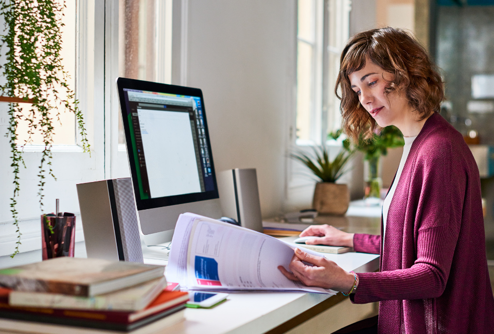 A teacher using the learning management system (LMS) to organize curriculum in the SIS.