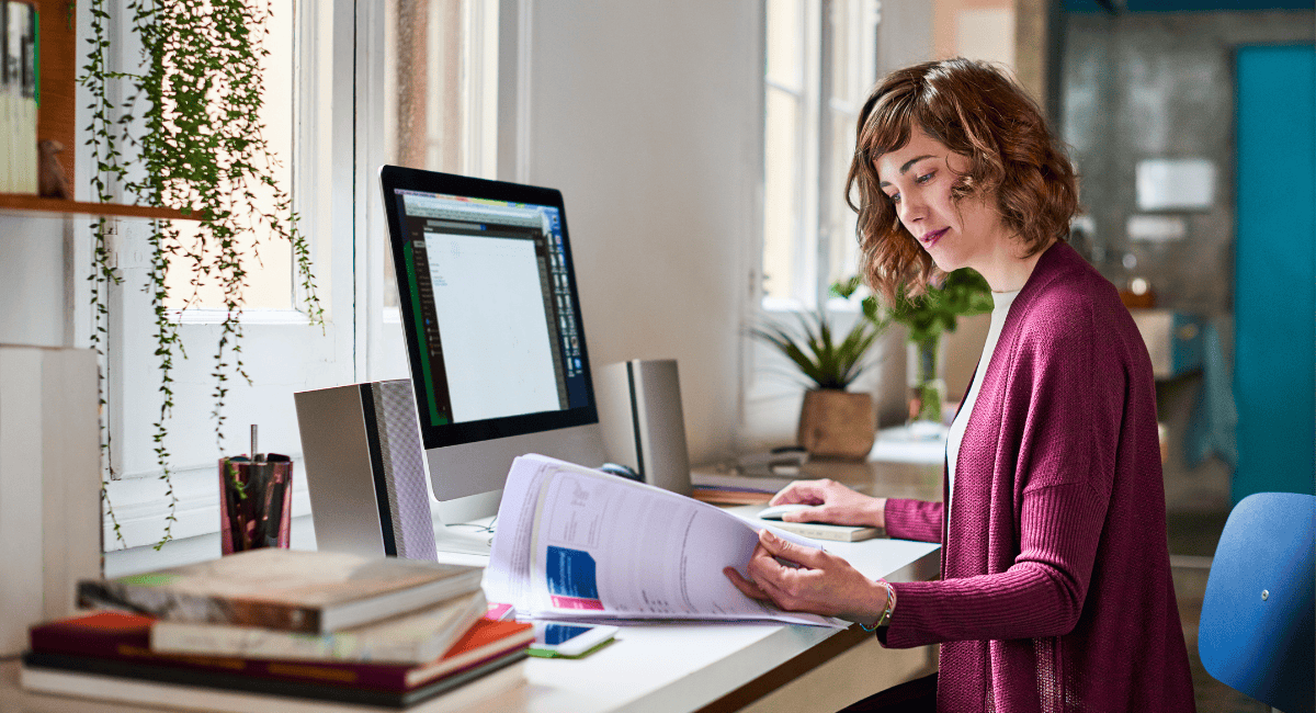 A teacher using the learning management system (LMS) to organize curriculum in the SIS.