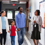 Parents take a tour of a school in a school choice state.