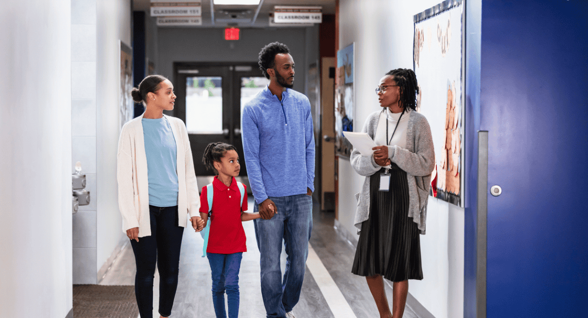 Parents take a tour of a school in a school choice state.