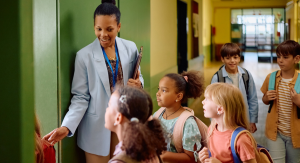 teacher-welcomes-new-students-to-charter-school