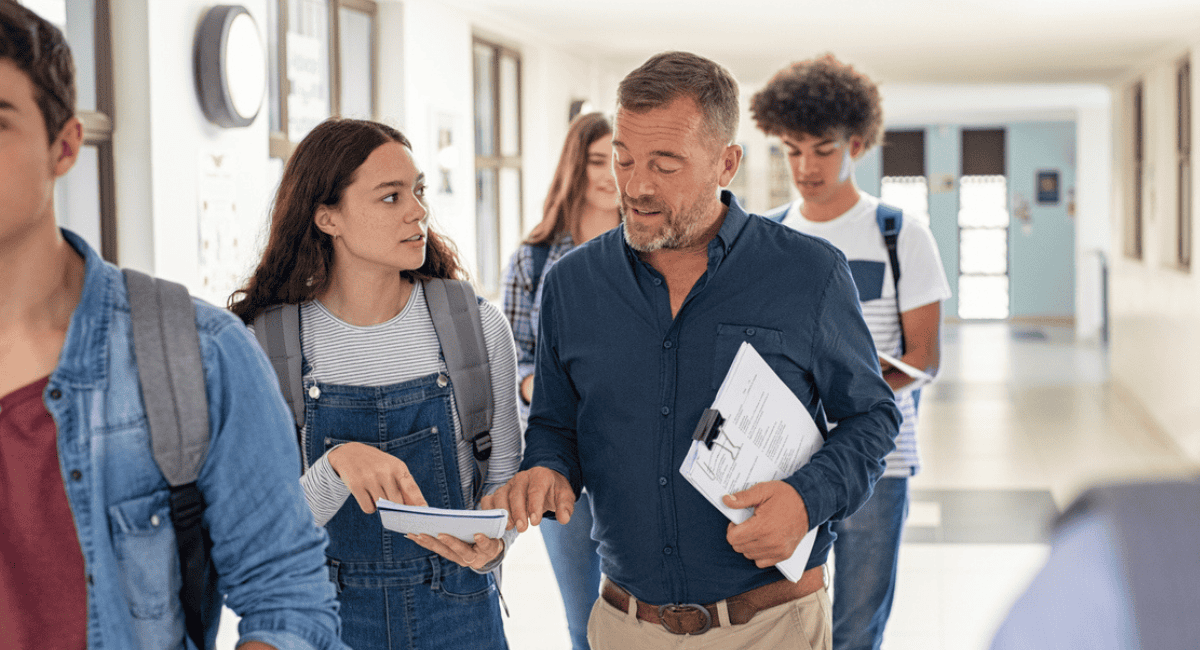 teacher-talks-with-student-in-hallways