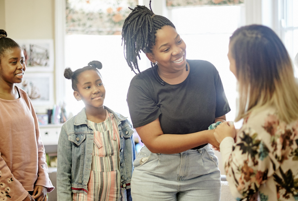mom-greeted-teacher-at-parent-engagement-event