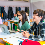 A full classroom of students shows the importance of average daily attendance to charter school funding.