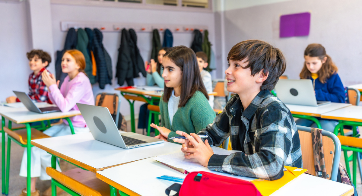 A full classroom of students shows the importance of average daily attendance to charter school funding.