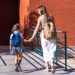 parent-walks-child-into-school
